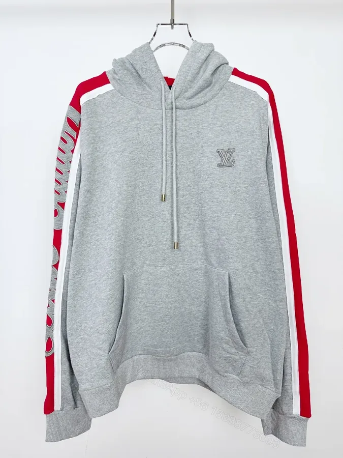 View 1 of Grey Mélange Hoodie with Red Tape – Premium Comfort & Embroidery