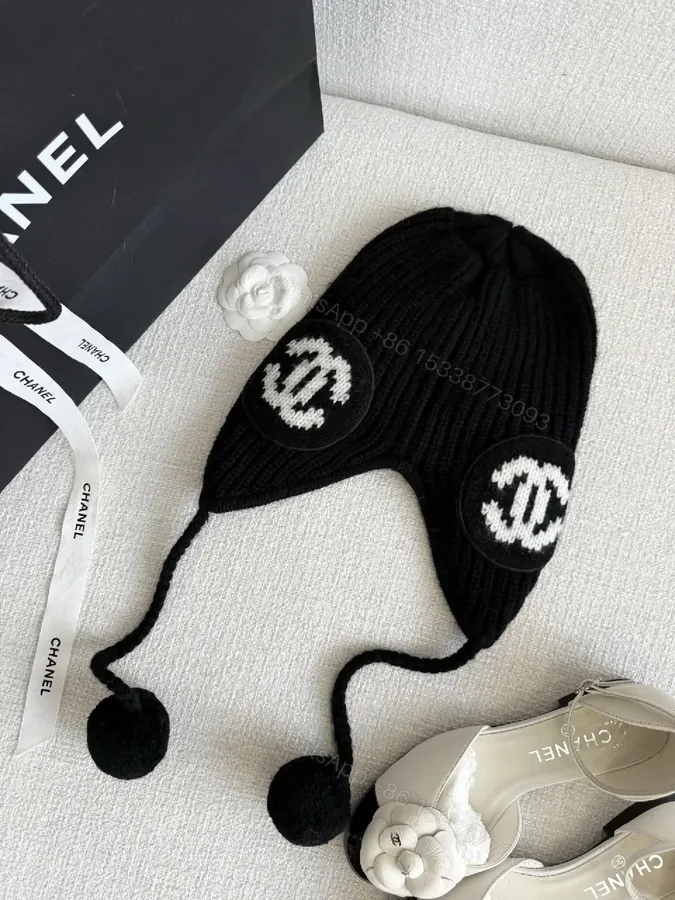 View 1 of Chic Knit Beanie with Logo Patches and Earflaps