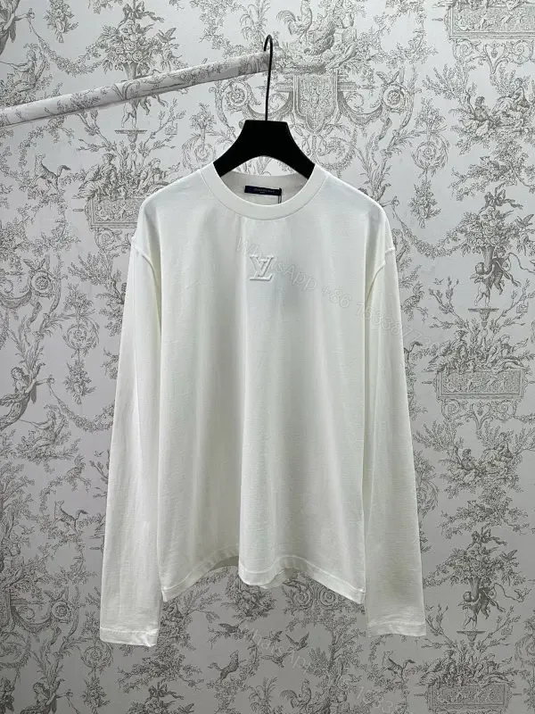 View 1 of Minimalist Luxe White Crewneck with Subtle Embossed DetailTop