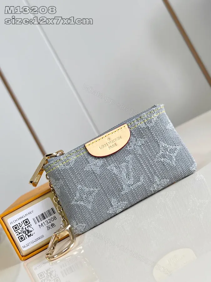 View 1 of Monogram Canvas Compact Wallet: Luxe Everyday Essential