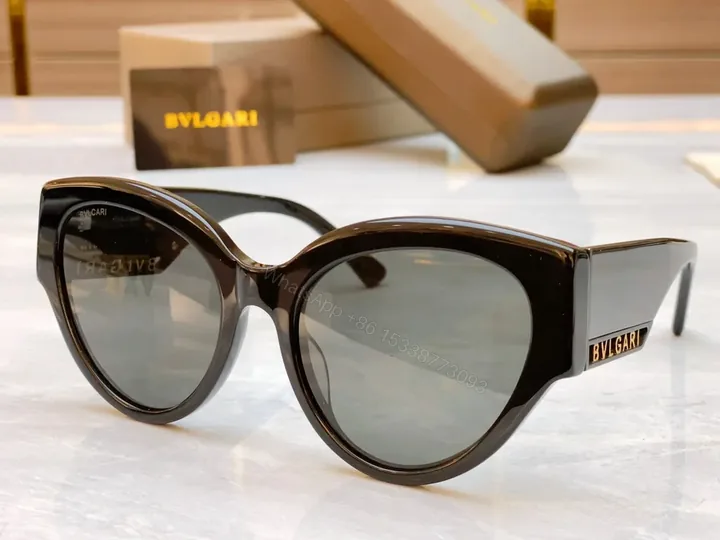 View 1 of Bold Black Acetate Cat-Eye Sunglasses â€” Modern Glam, UV400 Lenses