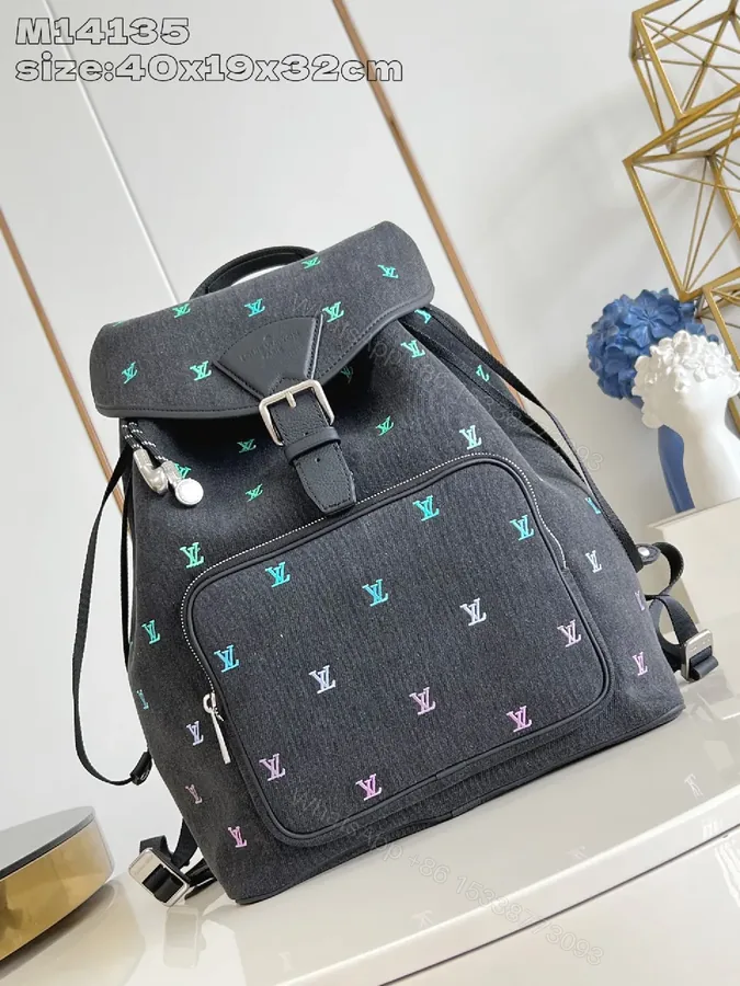 View 1 of Colorful Denim Backpack: Monogram-Luxe, Practical & Polished