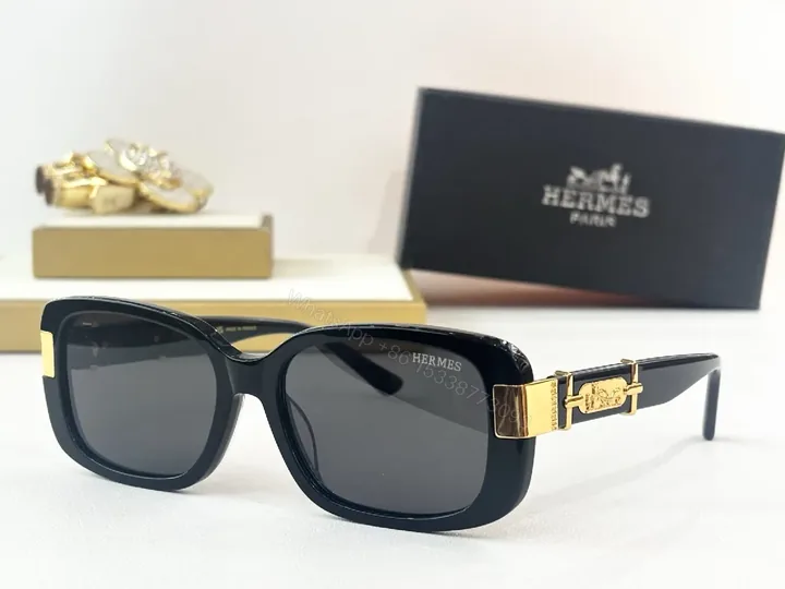 View 1 of Black Acetate Cat-Eye Sunglasses with Gold Hardware - Luxe, Comfortable, Bold Style