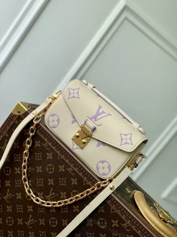 View 1 of Lavender LV-Accent Canvas Mini Bag with Chain Strap