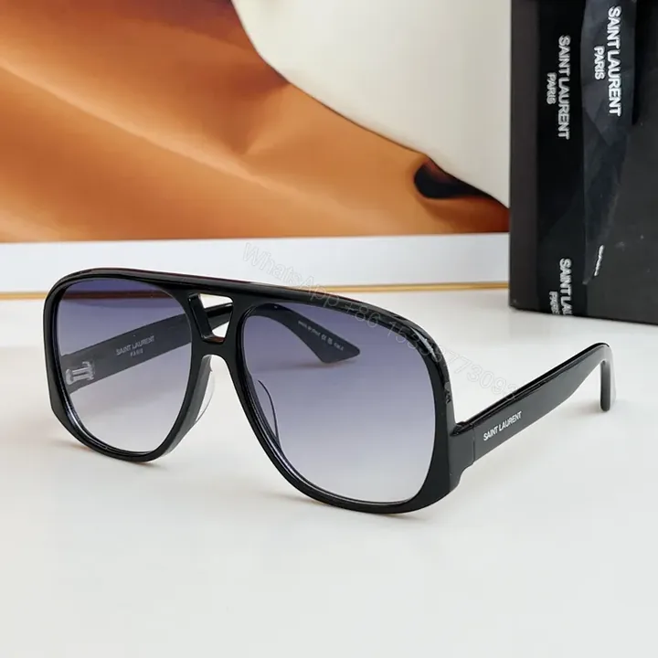 View 1 of Bold Saint Laurent Sunglasses â€“ Oversized Shield Frame, Gradient Lenses