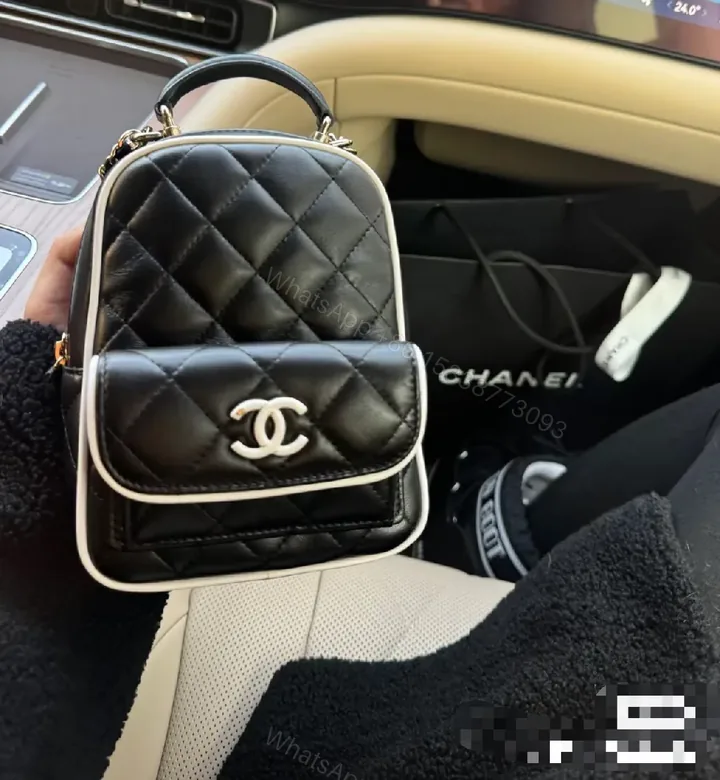 View 1 of Quilted Black Leather Mini Backpack – Luxe, Chain-strap Style