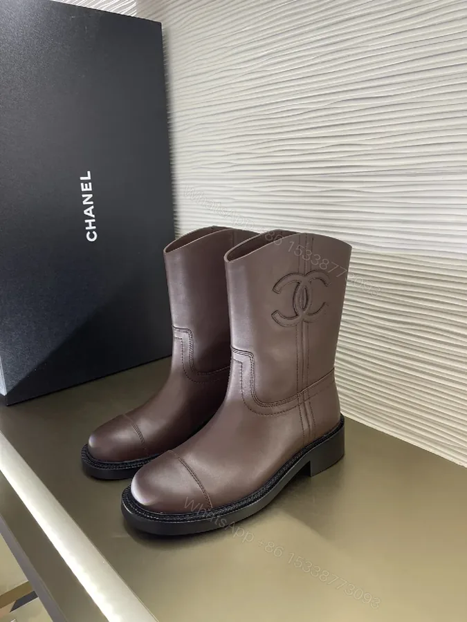 View 1 of Brown Leather Knee-High Boots with Subtle Couture Embellishment