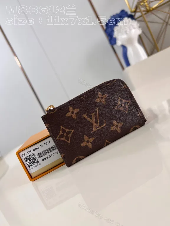 View 1 of Compact Monogram Wallet â€“ Signature Pattern, Everyday Luxury