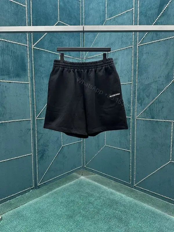 View 1 of Black Quick-Dry Swim Shorts | Minimalist, Structured, All-Day Comfort