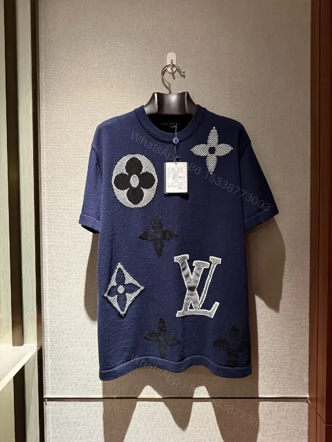 View 1 of Textured Knit Dress in Navy with LV Motifs: Luxe Statement Dress