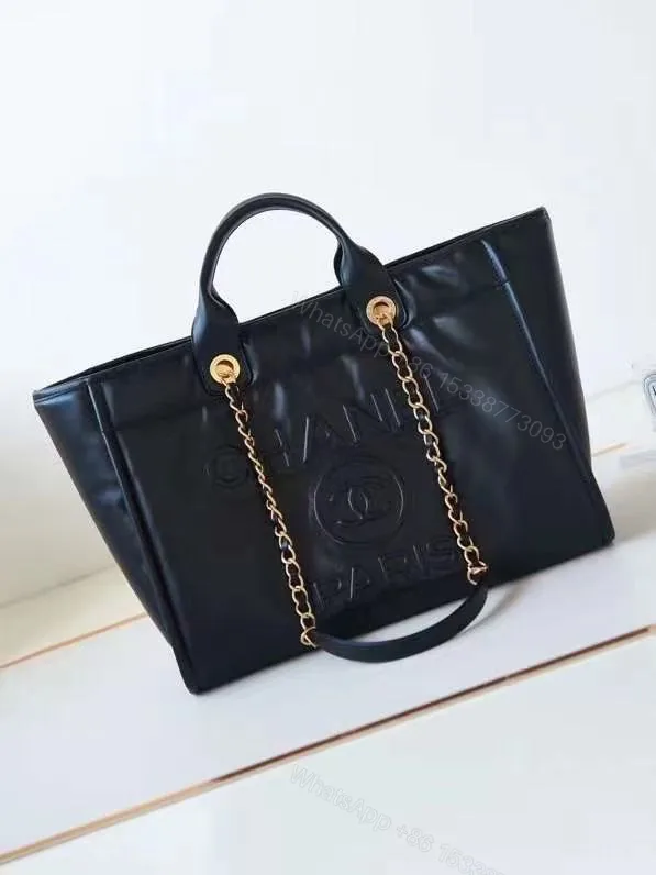View 1 of Chanel Black Calfskin Leather Deauville Tote Bag