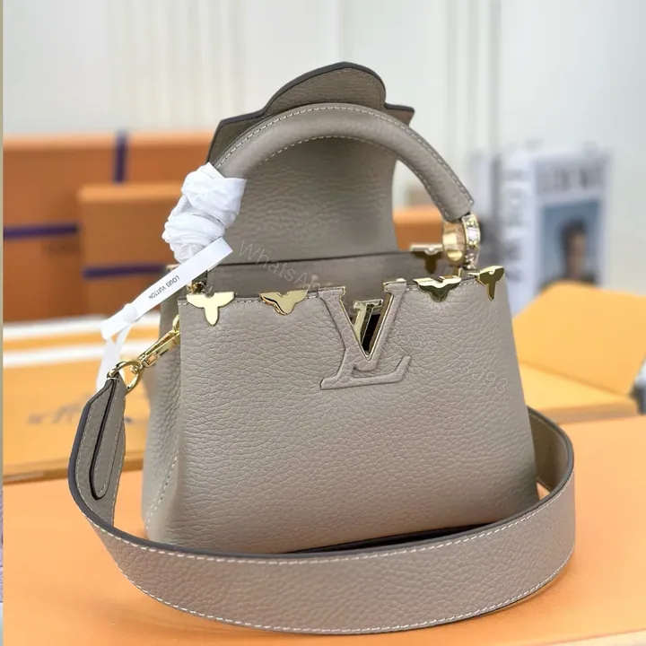 View 1 of Louis Vuitton LV Capucines Lock Gold Handbags Cowhide Leather 21cm