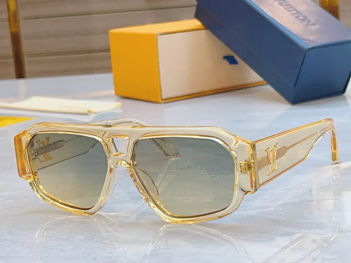 View 1 of Translucent Luxe Sunglasses: Signature Designer-Detailed Eyewear