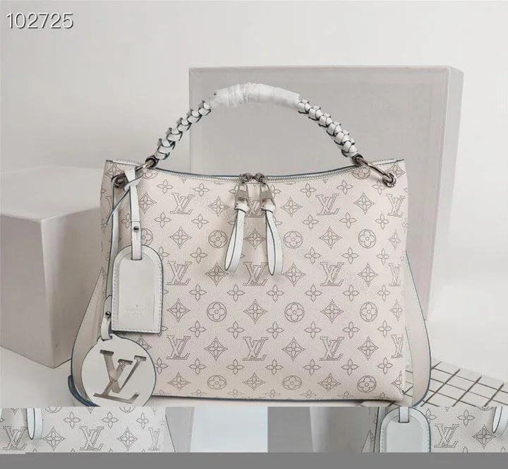 View 1 of Louis Vuitton Monogram Mahina Beaubourg Mm Hobo