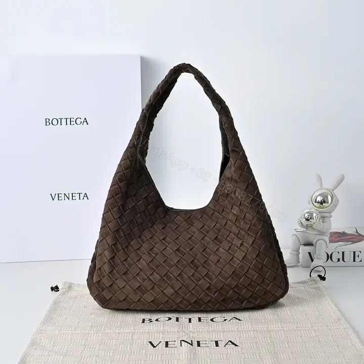 View 1 of brown woven leather hobo bag with intrecciato texture for everyday luxury