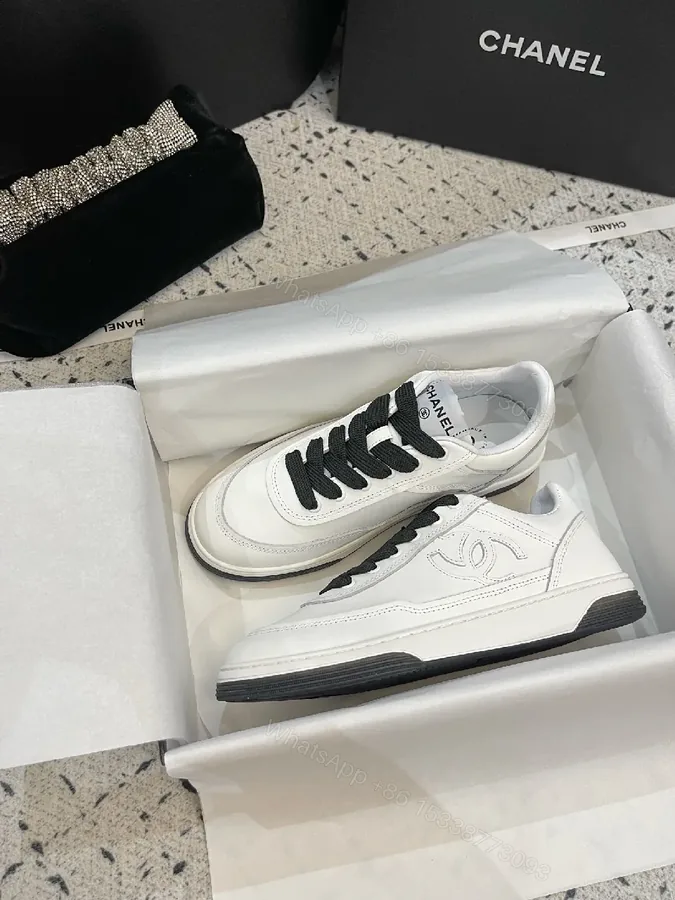 View 1 of White Leather Low-Top Sneakers with Luxe Detailing