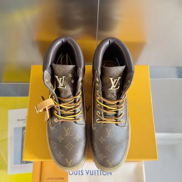 View 1 of Patterned Leather Boots with LV Hardware â€” Monogram Luxe Boots