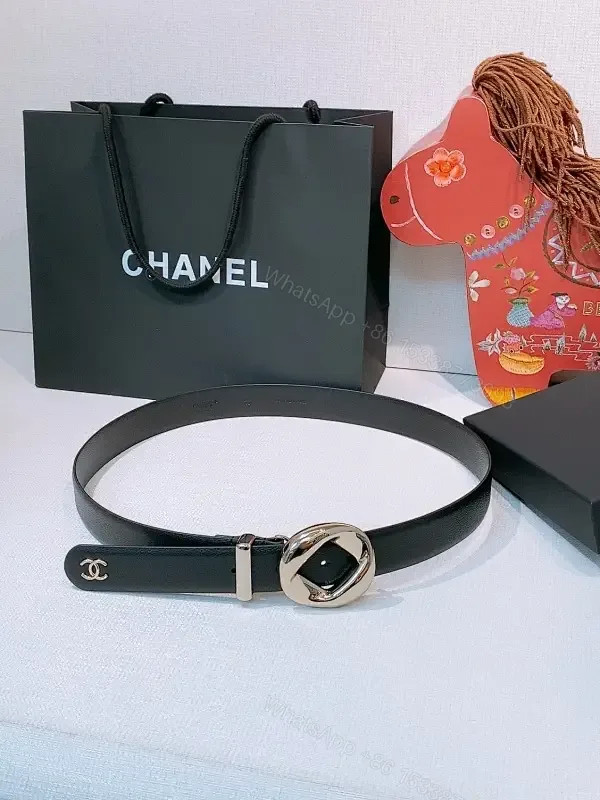 View 1 of Sleek Black Leather Belt - Minimalist Modern Luxury Accessory