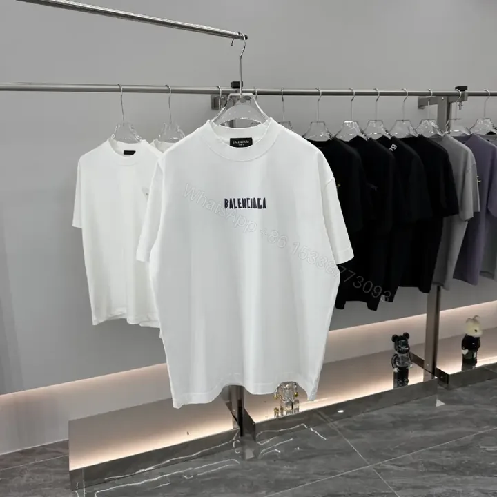 View 1 of White Cotton Minimalist Tee with Centered Logo