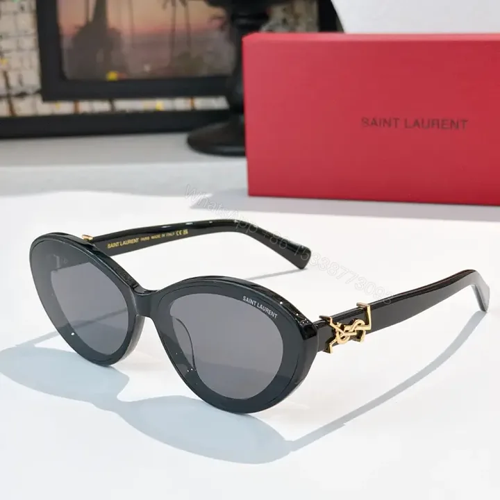 View 1 of Chic Black Round Sunglasses with Gold Hardware