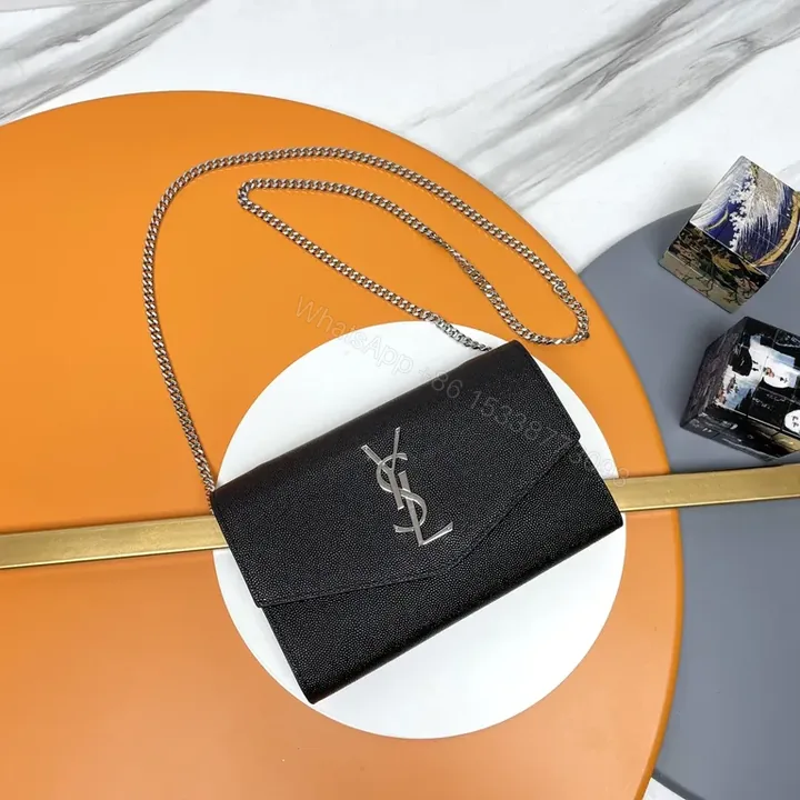 View 1 of Structured Black Leather Clutch with Chain Strap â€“ Day to Night