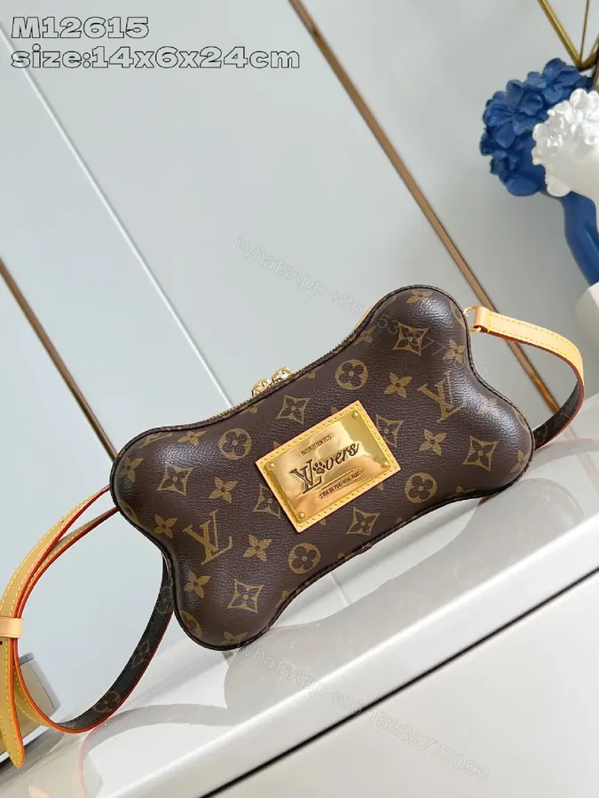View 1 of Monogram Canvas Bone Bag: Luxe Everyday Chic