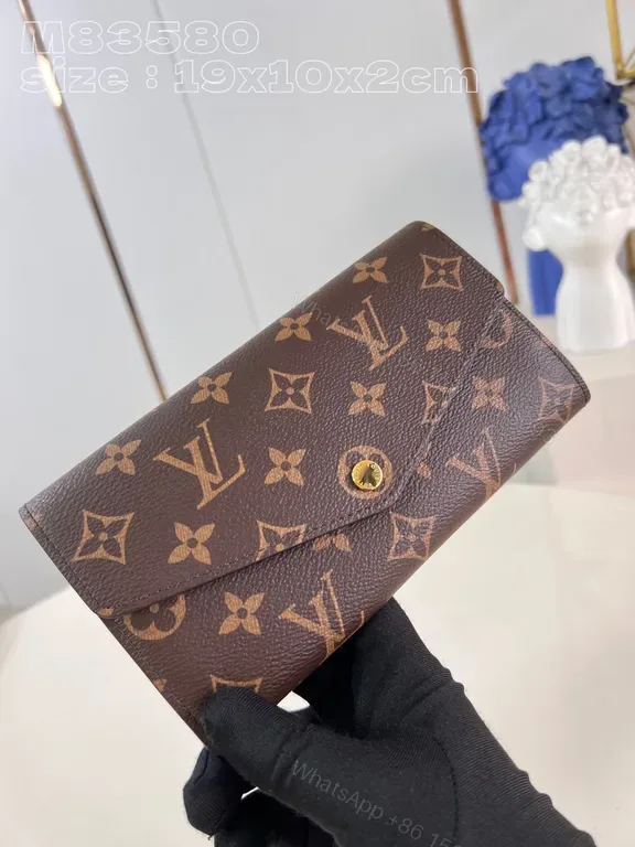 View 1 of Compact LV Monogram Wallet: Structured Luxury, Everyday Elegance