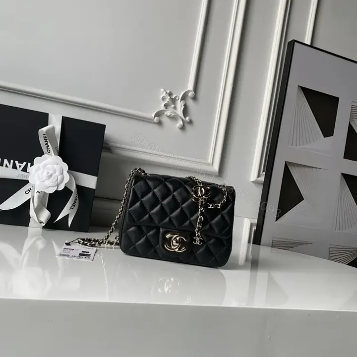 View 1 of Black Quilted Leather Flap Bag with Chain, Classic Weekender Elegance