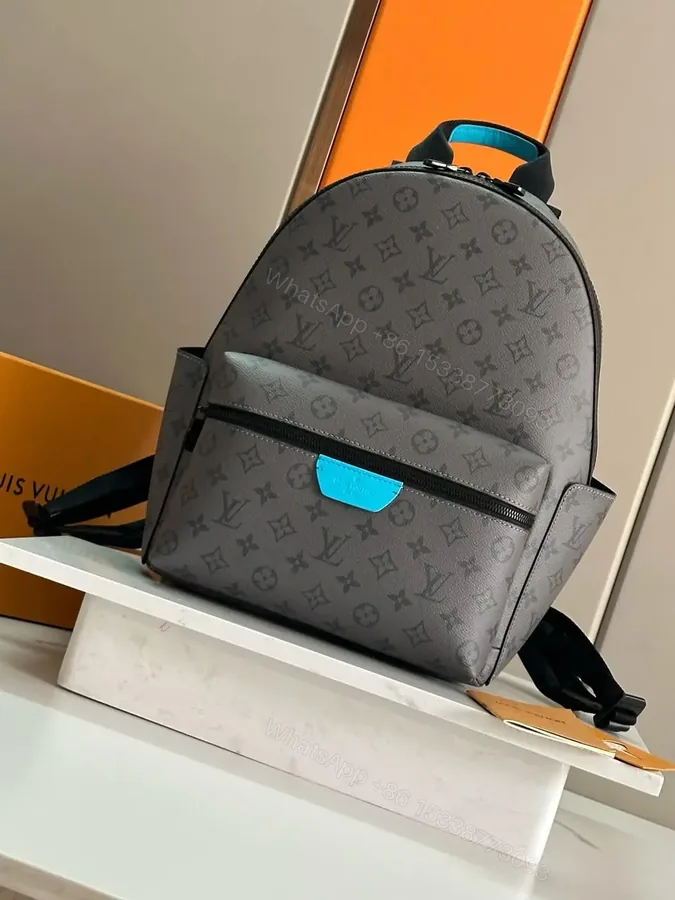 View 1 of Louis Vuitton Discovery Backpack PM