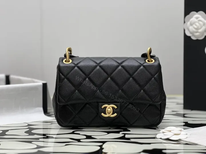 View 1 of Compact Quilted Black Flap Bag with Gold Hardware, Chain Carry