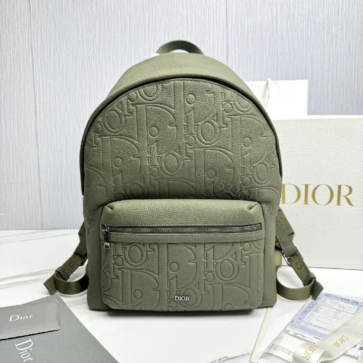 View 1 of Olive Leather-Textured Compact Backpack with Dior-Inspired Pattern