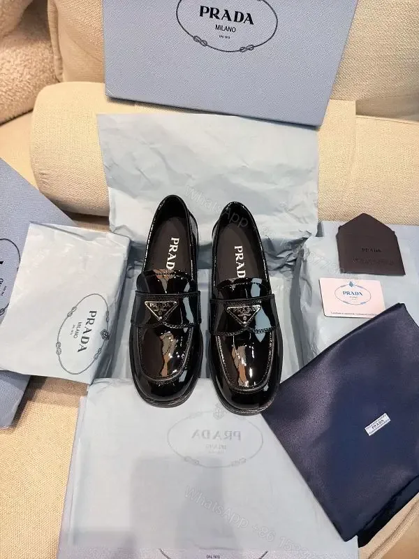 View 1 of Black Patent Leather Loafers Prada Style Feature: Logo Detail Shoe Type: Loafers