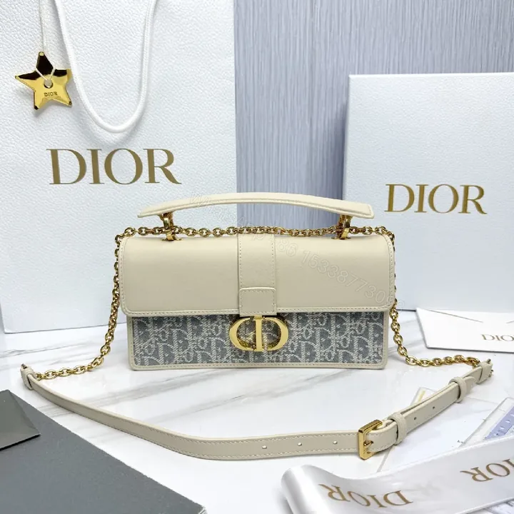 View 1 of Cream Leather Shoulder Bag: Monogram Chain Detail, Compact Everyday Luxury