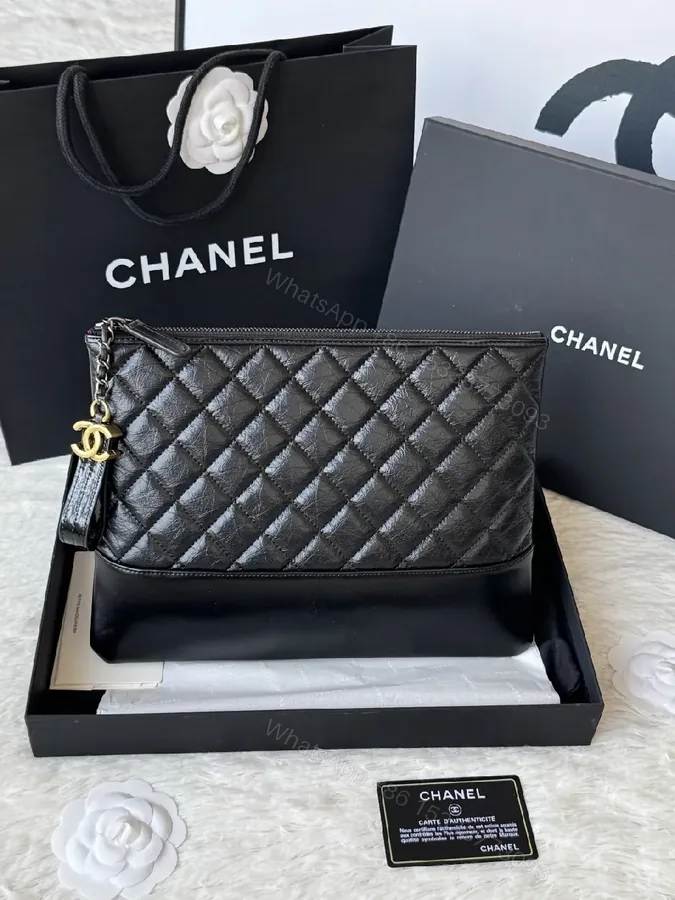 View 1 of Quilted Leather Clutch: Sophisticated, Multi-Use Night Bag