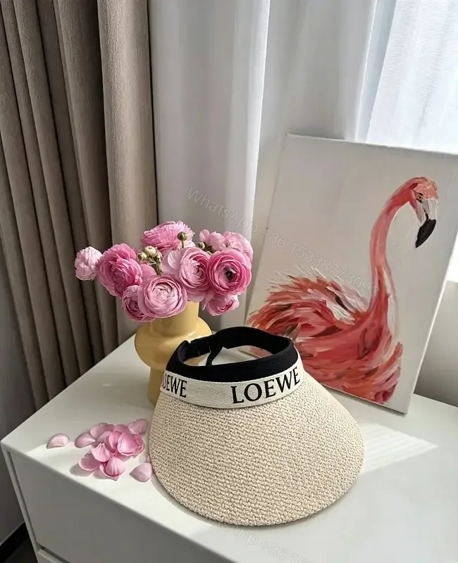 View 1 of Natural Beige Straw Visor Hat — Wide-Brim, Elastic Band, LOEWE Band