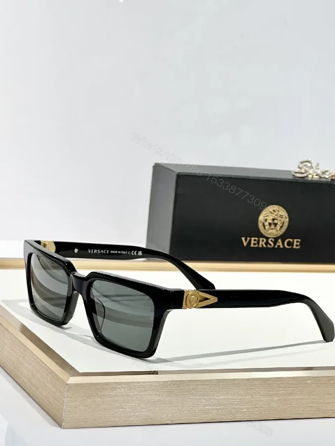 View 1 of Bold Black Acetate Sunglasses with Gold-Accent Hardware
