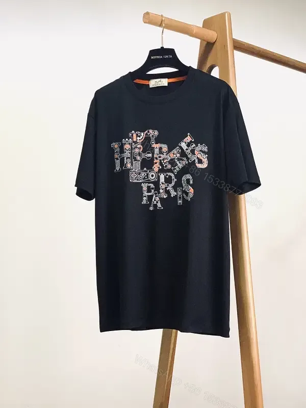 View 1 of Black Cotton Graphic Tee: Luxe-Inspired Statement Tee