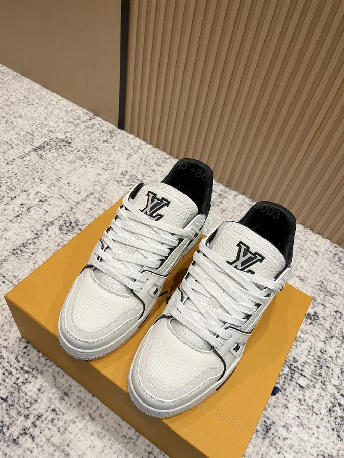 View 1 of White Leather Runner Sneakers with LV Detailing