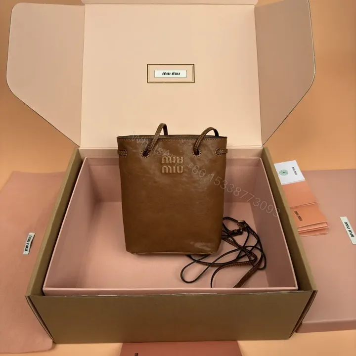 View 1 of 高仿miumiu*5NR460小羊皮水桶包棕色免檢版