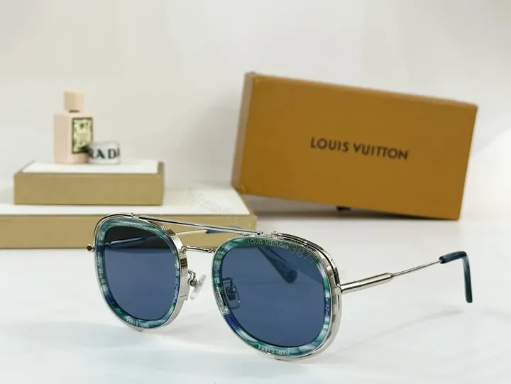 View 1 of Bold Texture Round Sunglasses: Sculpted Metal Frame, Blue Lensed