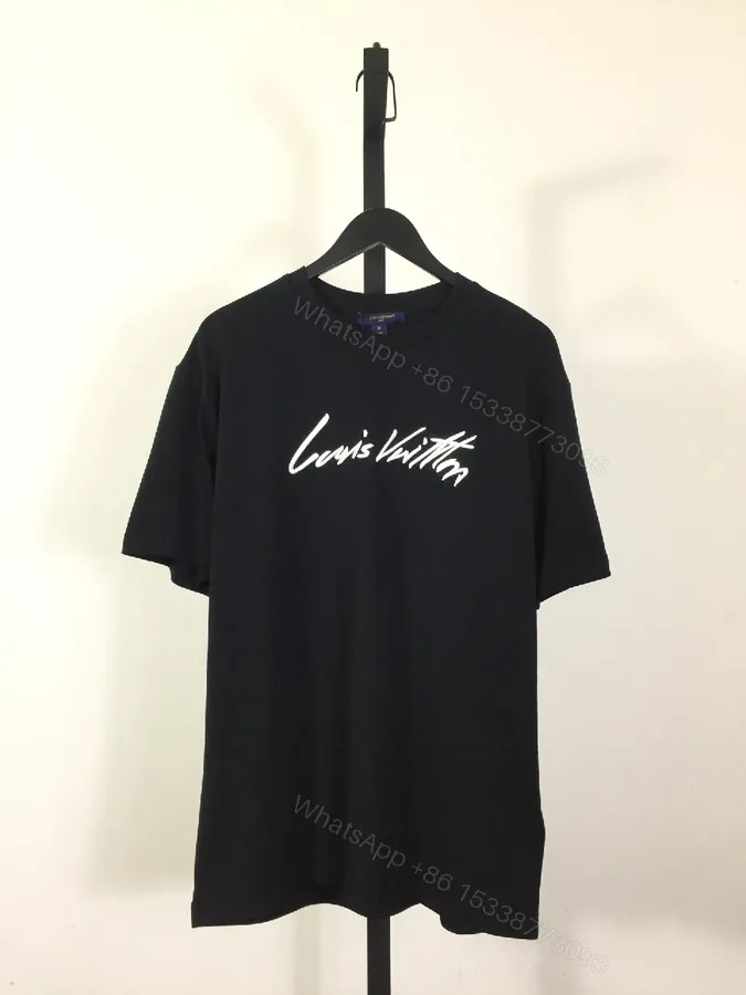 View 1 of Black Cotton Tee | Graphic Luxe Logo, Relaxed Fit, Durable