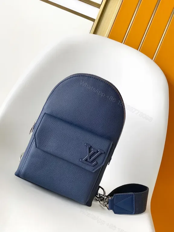 View 1 of Chic Blue Leather Compact Backpack with LV Detail
