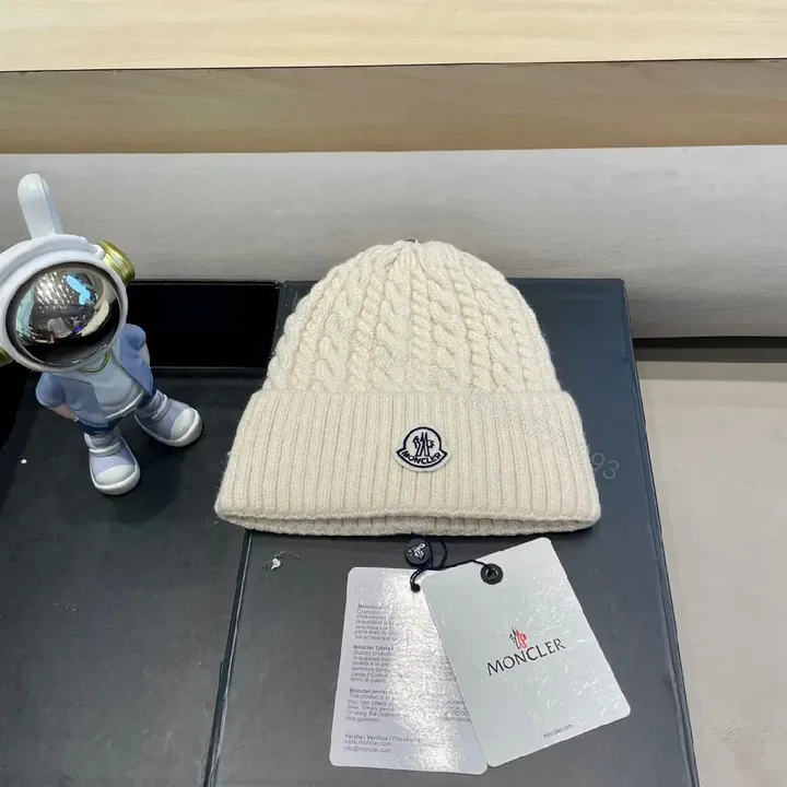 View 1 of Cream Knit Beanie | Wool Blend | Cable Knit | Moncler Emblem Gifted Luxury