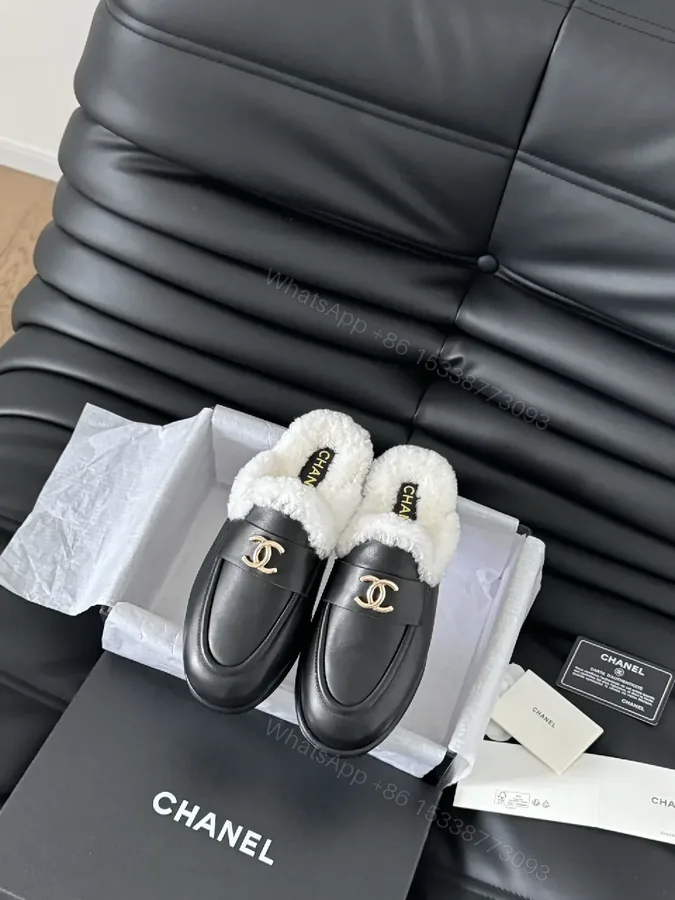 View 1 of Chic Black Leather Mules with Plush Shearling Lining