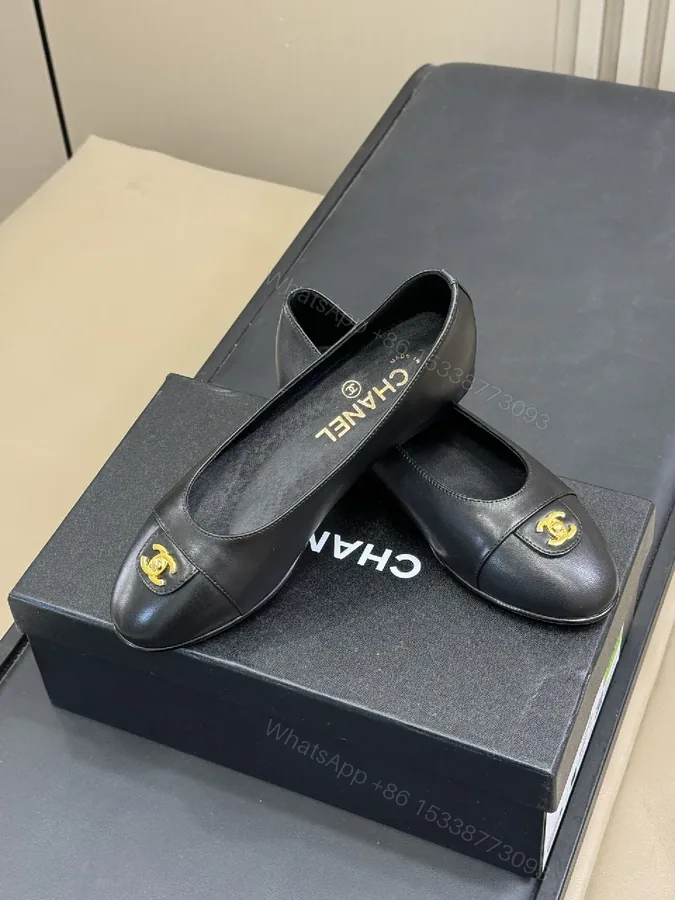 View 1 of Black Leather Ballet Flats with Gold Logo Detail, Comfortable, Dressy Style