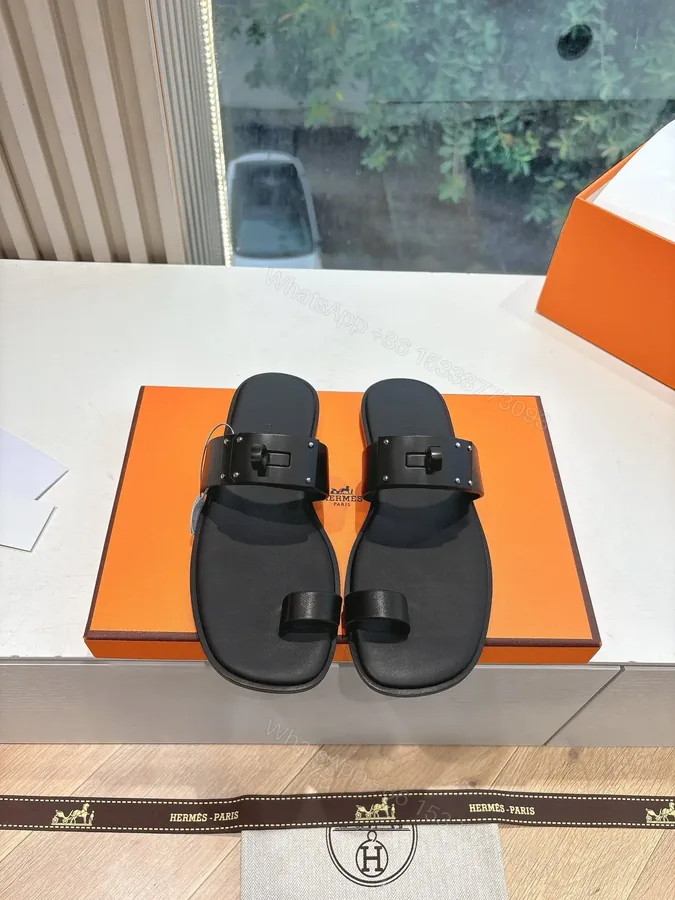 View 1 of Hermes Women Black Leather Toe Loop Mules