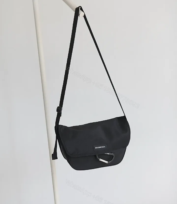 View 1 of Black Durable Matte Nylon Messenger Bag – Compact, Adjustable Strap, Minimalist Style