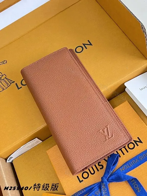 View 1 of Light Brown/Pale Pink Pebbled Leather Bi-Fold Wallet with LV Embossed Logo