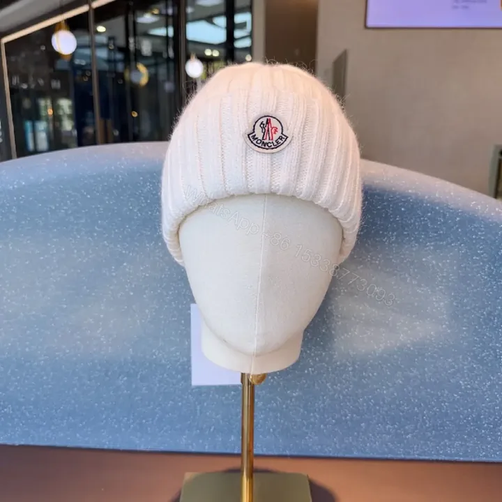 View 1 of Cozy Knit Beanie: Soft Ribbed Warmth, Subtle Emblem, Luxury Style