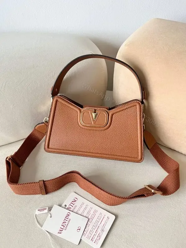 View 1 of Pebbled Leather Crossbody: Structured Chic, Everyday Luxury